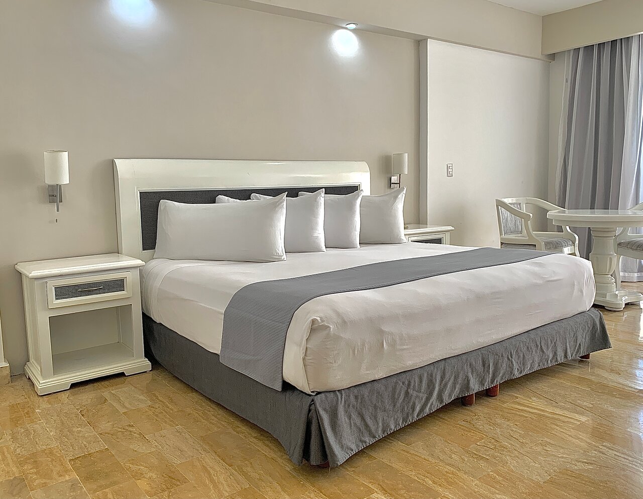 either Ocean View or Lagoon Sunset View, furnished balcony, flat screen, hair dryer, security box, telephone, ironing set, air conditioning, alarm clock radio. 