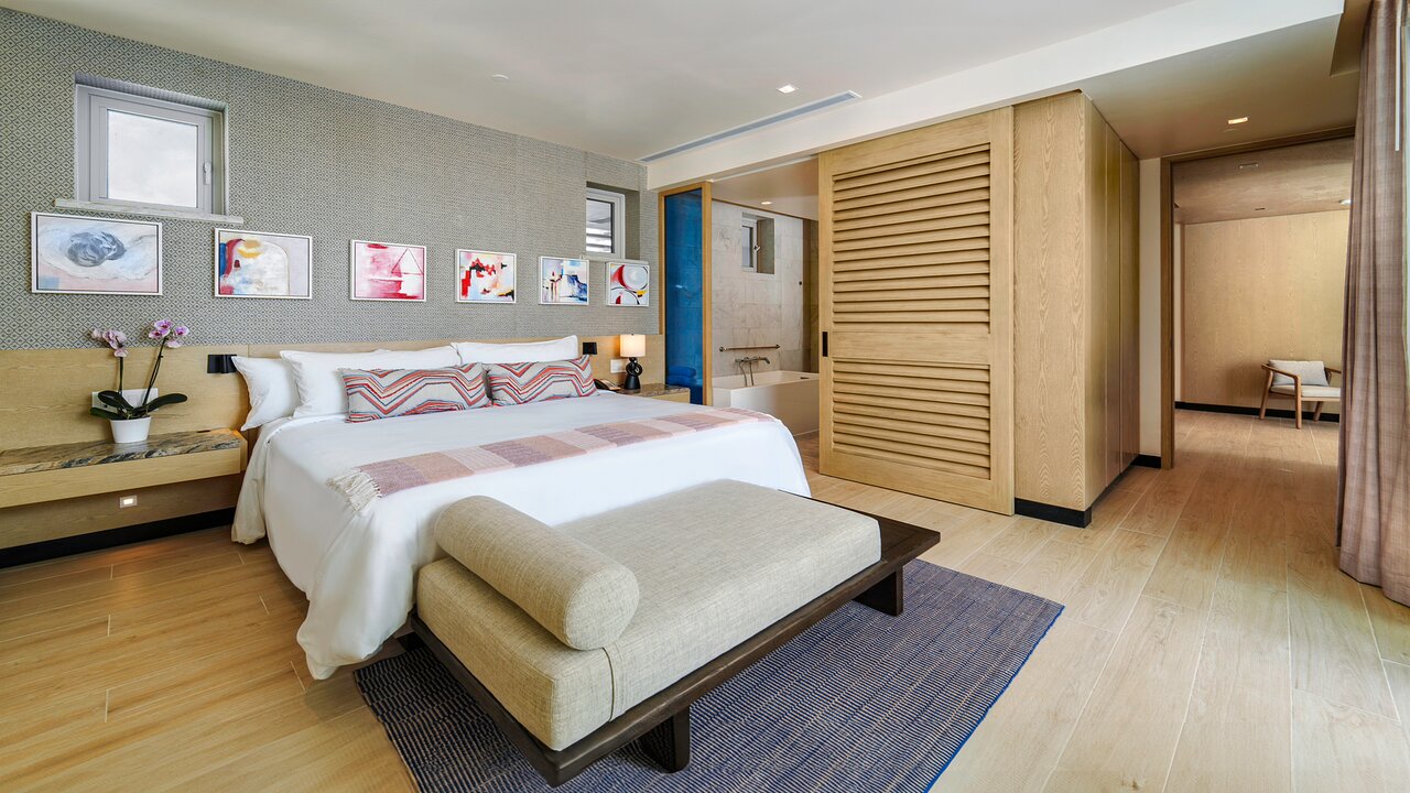Modern, elegant décor sets a soothing scene while sustainable design puts your mind at ease. Savor uninterrupted Caribbean views from your oversized balcony that effortlessly blends indoor/outdoor living, stretch out in the comfortable sitting area while using free high-speed WiFi, or take advantage of the flat-screen HDTV with streaming capability. 