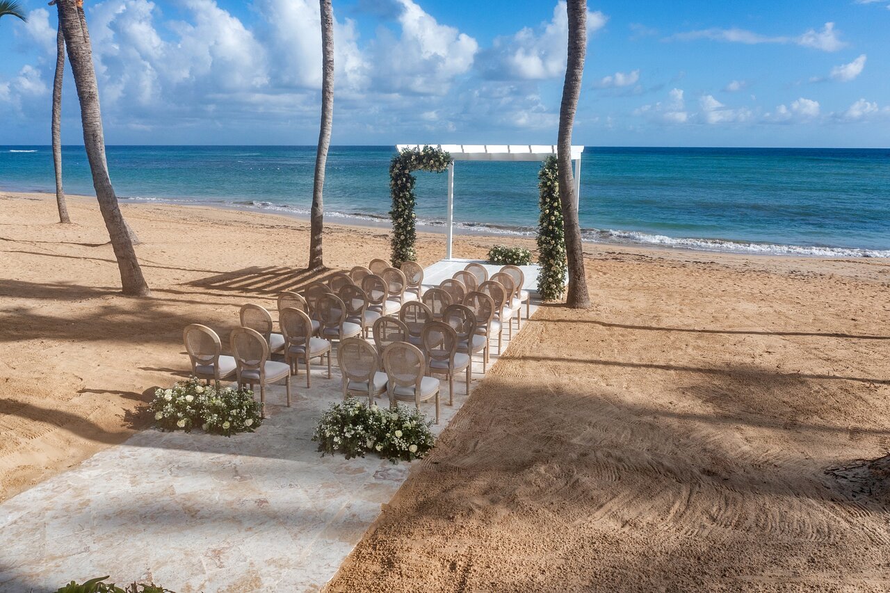 Stunning wedding ceremony venues surrounded by tropical gardens and ocean views, perfect for hosting intimate gatherings or celebrations up to 100+ guest