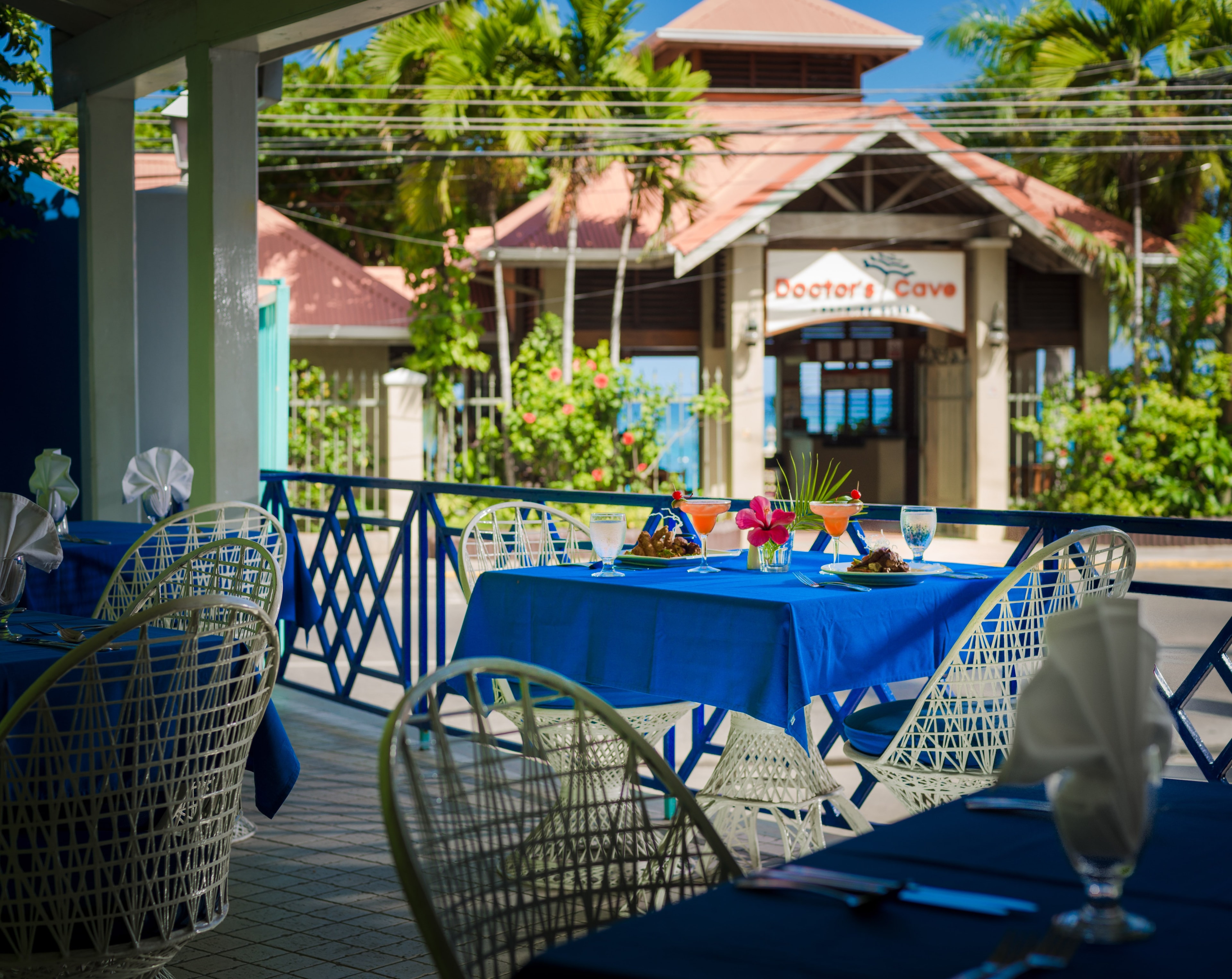 Enjoy a delicious meal  at our cafe style restaurant while taking in the activity of Montego Bay