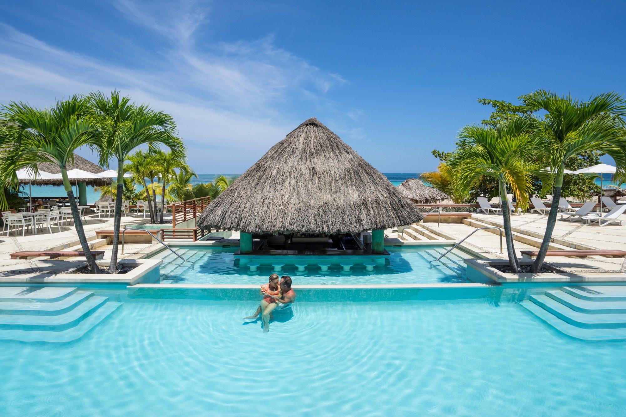 Couples Swept Away swim-up bar