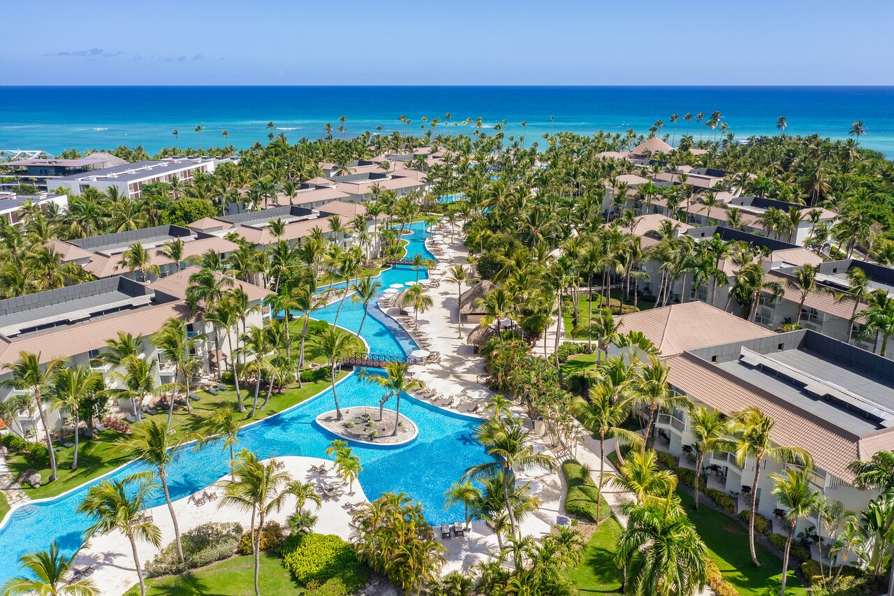 Tucked away on palm-studded Uvero Alto Beach in Punta Cana, this elegant beachfront retreat blends colonial charm with vibrant energy for travelers seeking a meaningful escape