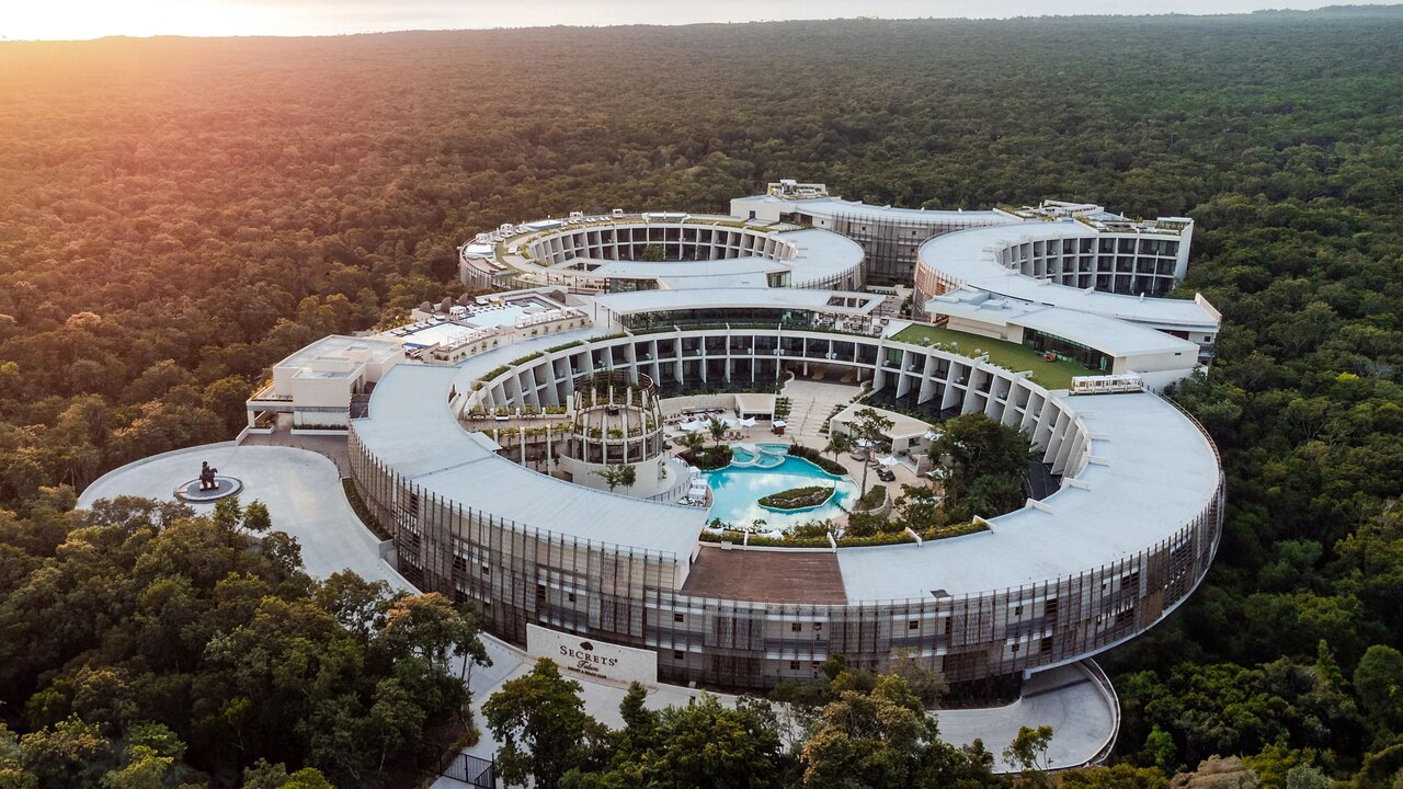 Discover the lush, mystical jungle at Secrets Tulum Resort & Beach Club , an adults-only sanctuary. Nestled in the heart of historic Tulum, this resort seamlessly blends nature-inspired elegance with modern luxury. Guests will be captivated by the stunning jungle surroundings, while the nearby city of Tulum invites exploration of ancient Mayan sites.